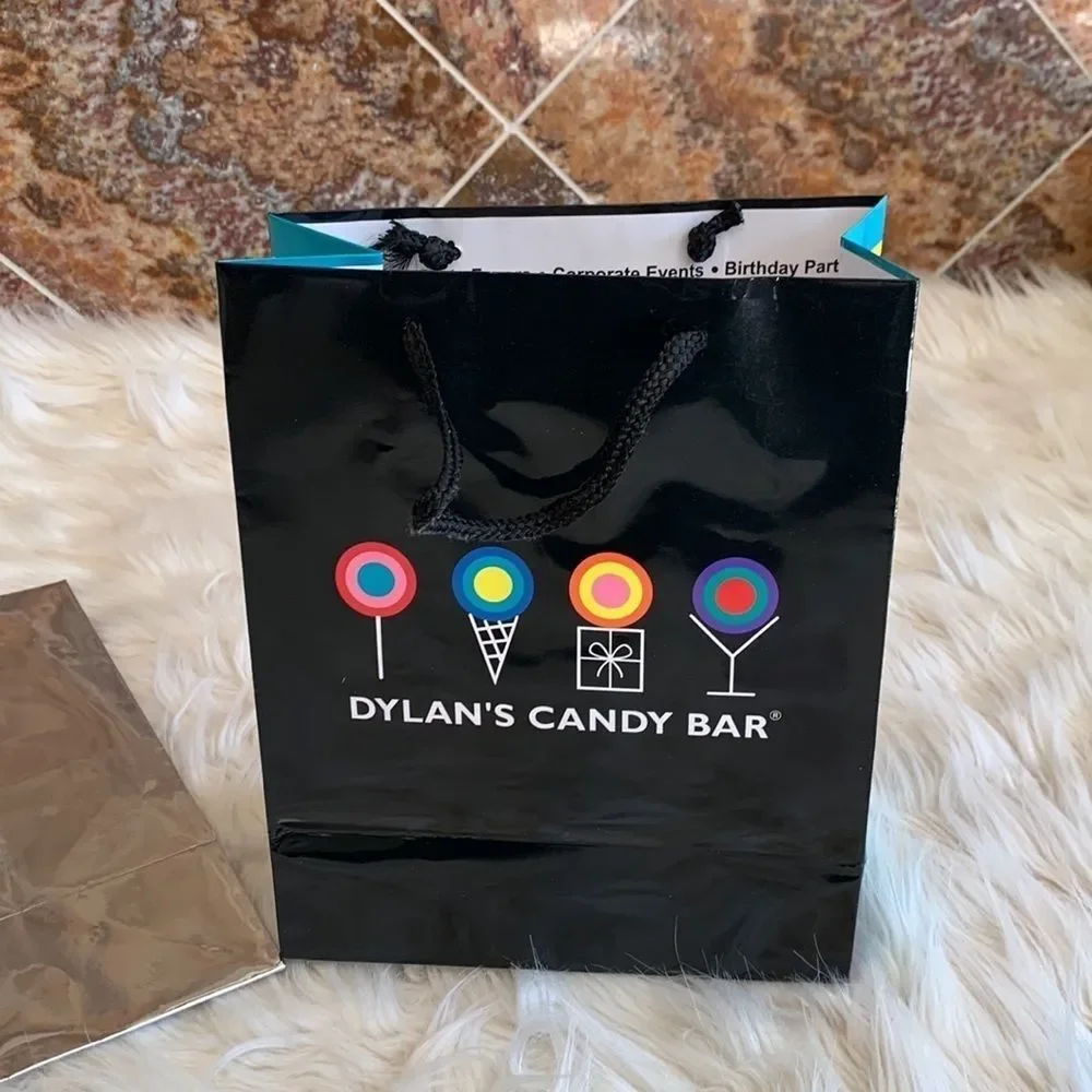 Dylan’s Candy Bar Paper Shopping Bags. One Black and One Silver Metallic.